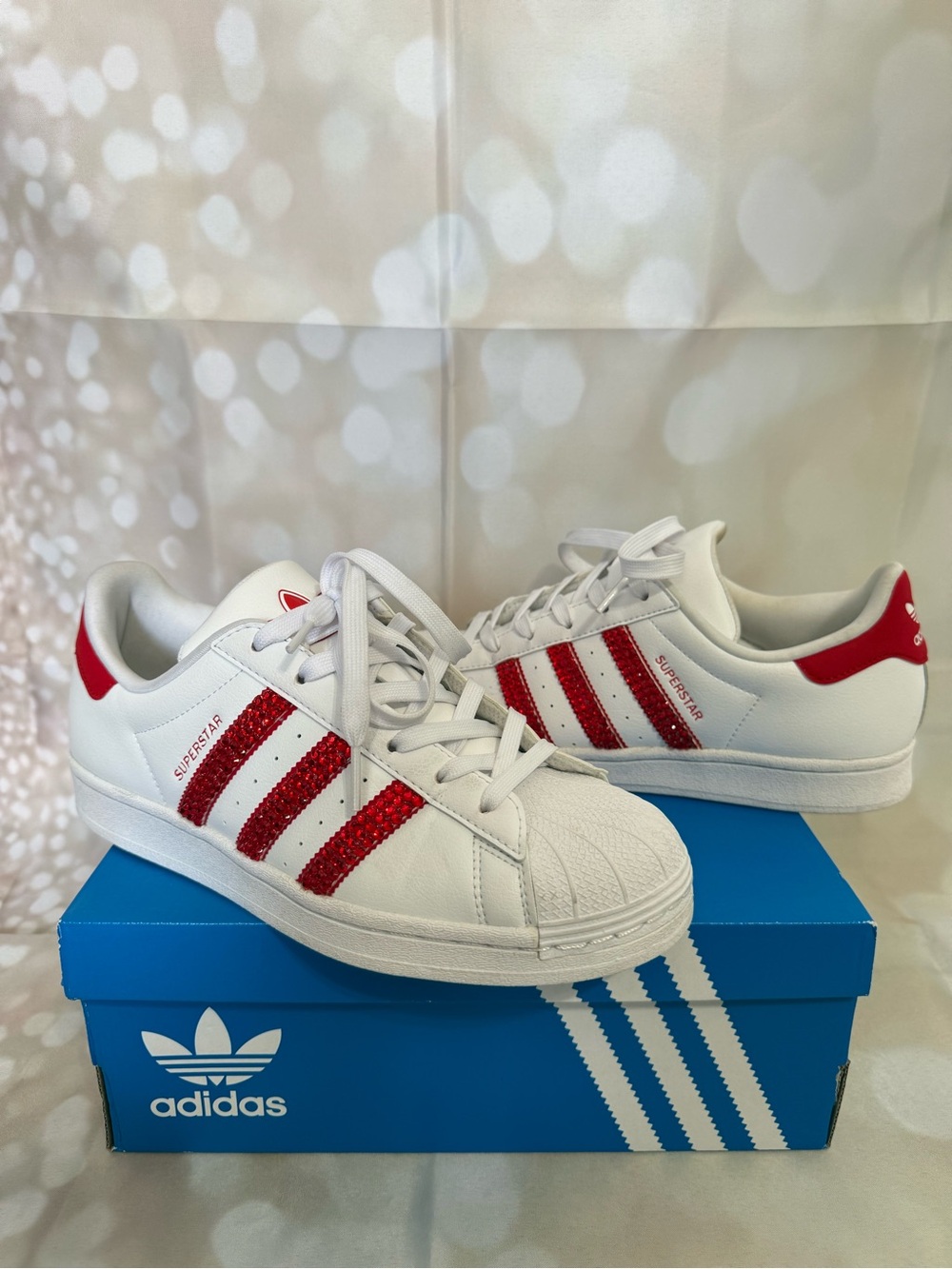 adidas  Superstar Sneakers in White with Red Glitter Stripes